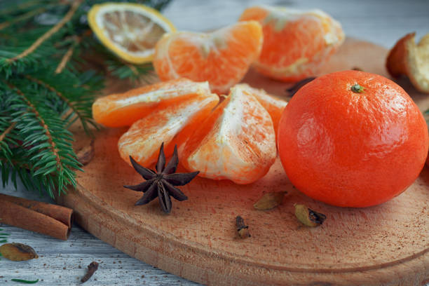 istock Mandarins (tangerines), spices and fir tree branches. 875721880
