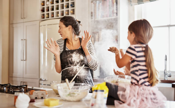 istock Getting messy is part of the fun of baking together 875722538