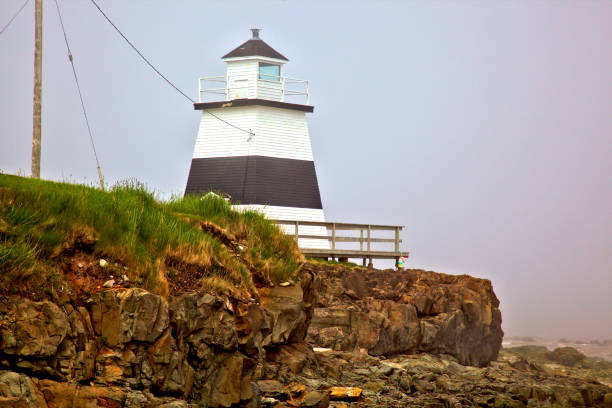 istock Margaritsville lighthouse, Nova Scotia, Canada, foggy 875722666