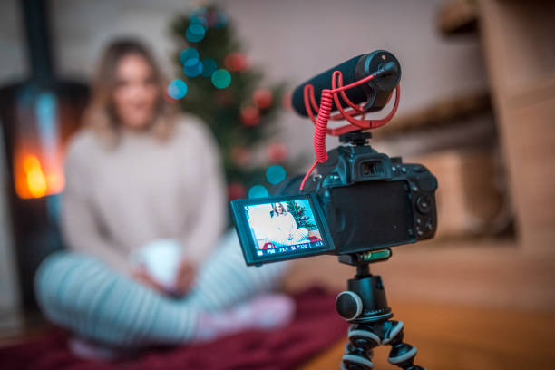 istock Woman vlogging on Christmas eve 875722844