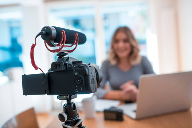 istock Young woman vlogging about her business life 875722862
