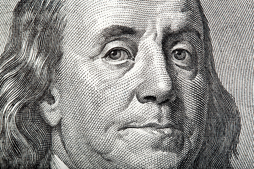 Close-up portrait of Franklin on American money. High resolution photo.