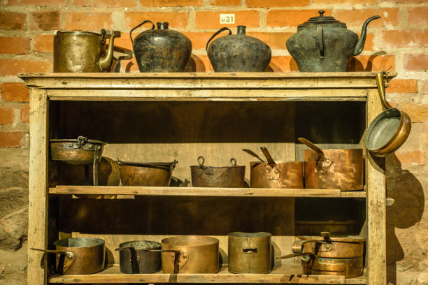 istock Old retro metal tableware on wooden shelf 875739310