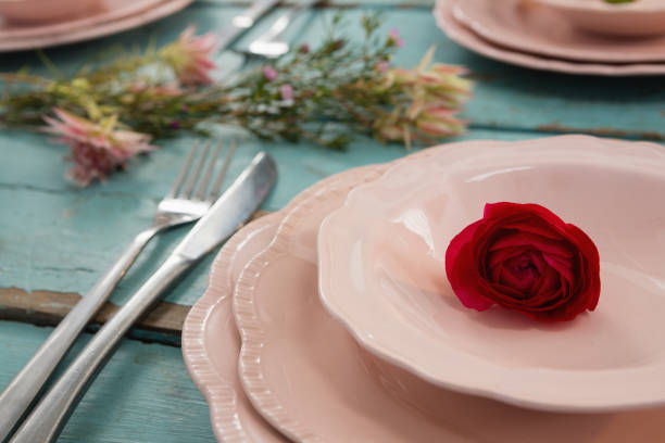istock Close-up of red rose in bowl 875739584