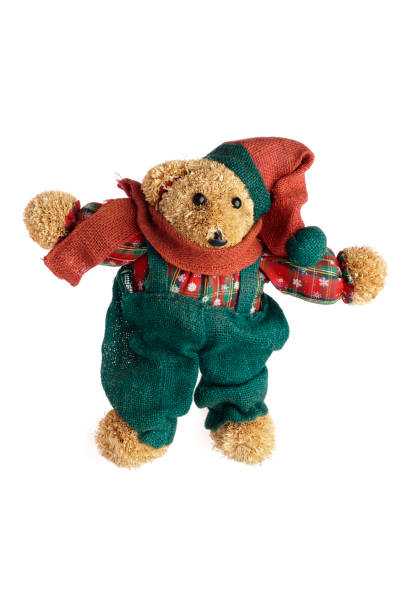 istock Teddy bear in winter clothes isolated on white background 875748738
