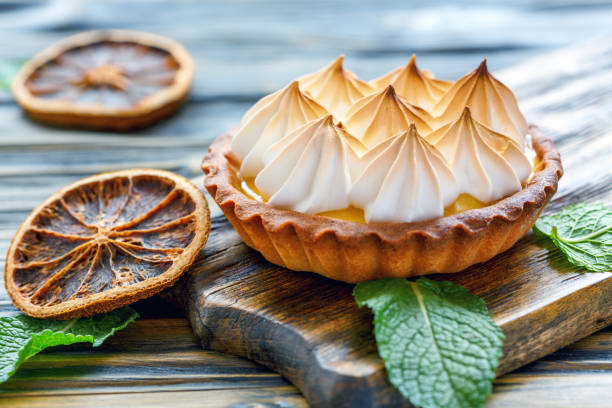 istock Tartlet with lemon cream and citrus crisps. 875752376