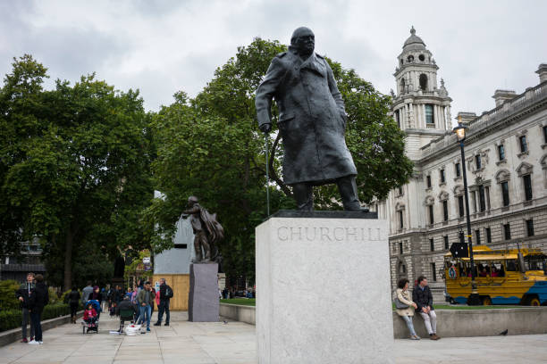 Sir Winston Churchill in London 'London, United Kingdom - September 10th 2017: Statue of Sir Winston Churchill (30 November 1874 a 24 January 1965) at Parliament Square in London opposite site to Big Ben in City of Westminster winston churchill prime minister stock pictures, royalty-free photos & images