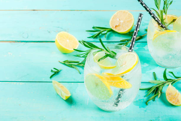 istock Cold drink with lemon and rosemary 875790052