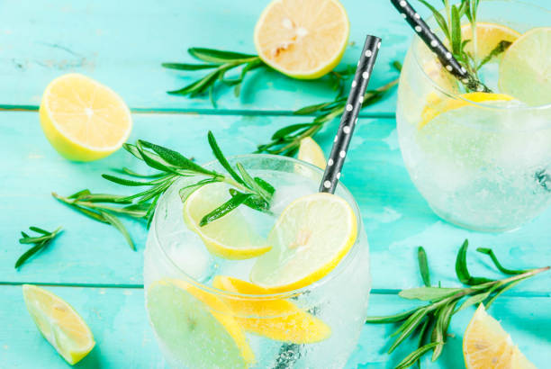 istock Cold drink with lemon and rosemary 875790058