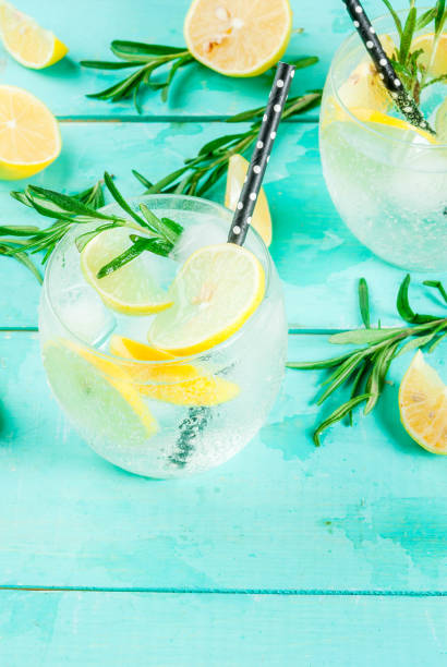 istock Cold drink with lemon and rosemary 875790130