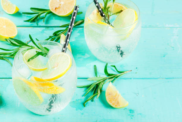 istock Cold drink with lemon and rosemary 875790142