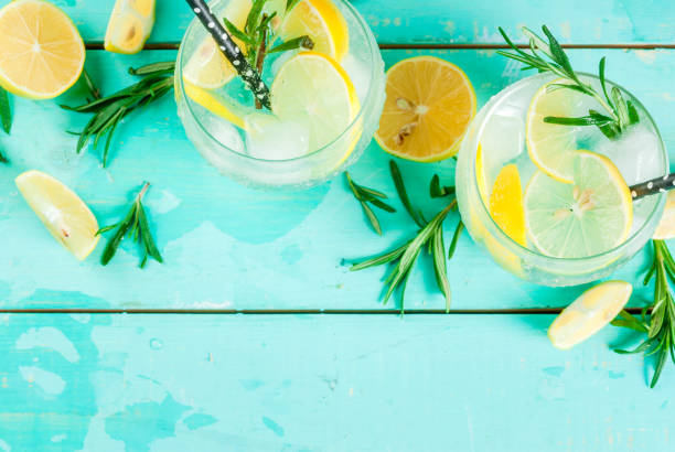 istock Cold drink with lemon and rosemary 875790146