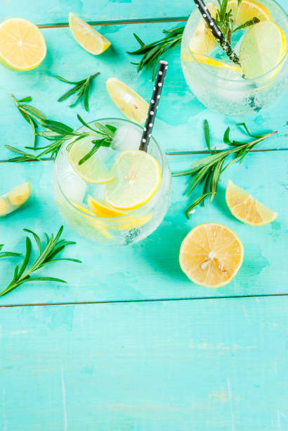 istock Cold drink with lemon and rosemary 875790168