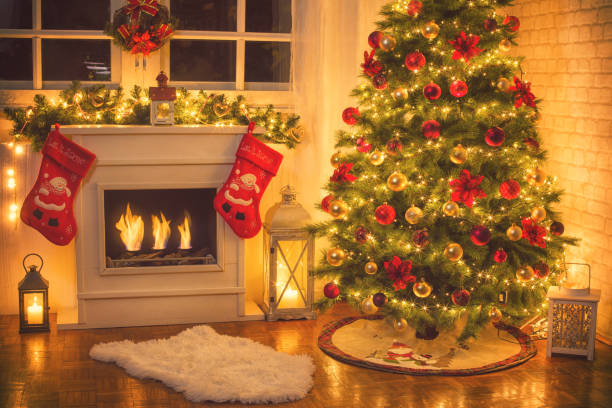 istock Christmas Tree Near Fireplace at Home 875790342