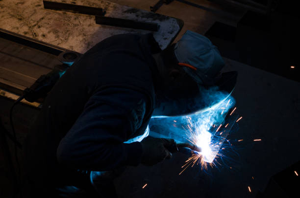 istock Worker Welding Metals I A Metal Factory 875794730