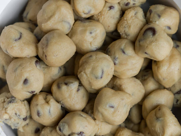 istock Uncooked Chocolate Chip Cookie Dough in Bowl Home Baked 875807922