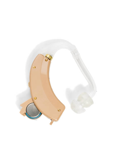 hörgerät nahaufnahme auf weißen hintergrund isoliert - hearing aid audiologist audiology small stock-fotos und bilder