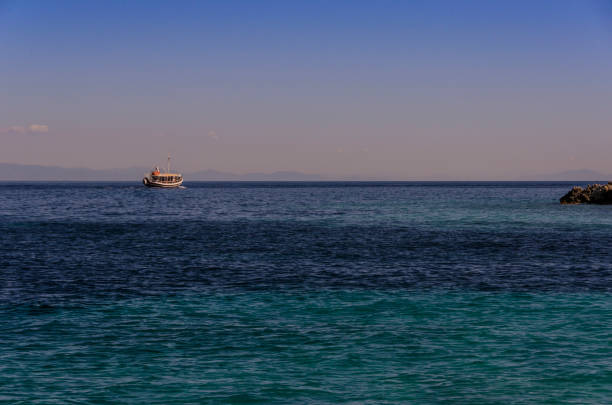 istock passenger boat on the coast of zakynthos 875814688