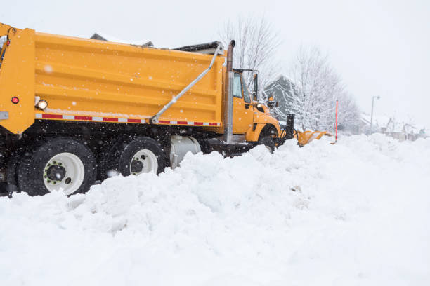 istock Snow Plow Plowing Street After Snow Storm 875815626