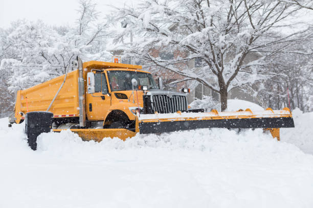 istock Snow Plow Plowing Street After Snow Storm 875815756