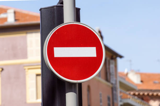 istock Red and white british no entry road sign 875826920
