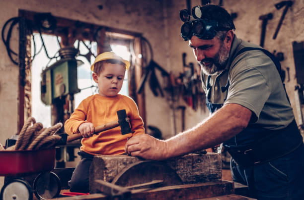 istock Grand parent and grand son in garage 875838390
