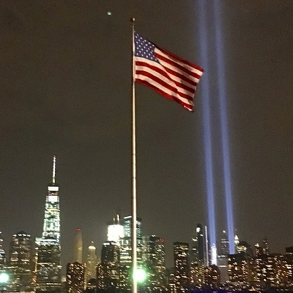 New York City displays the Tribute in Light, honoring those killed on September 11. The lights project skyward from the site of the original Twin Towers