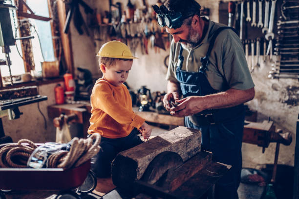 istock Grand parent and grand son in garage 875845294