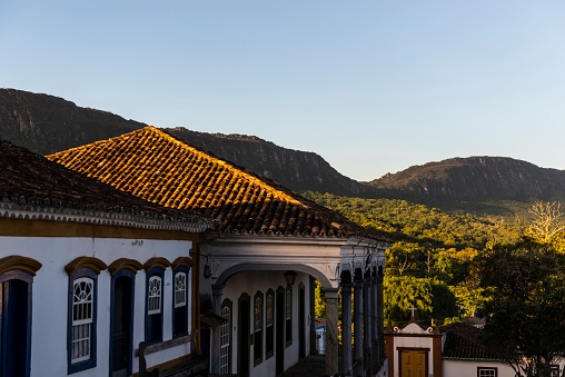 Historic city of Tiradentes in Minas Gerais with the colonial architecture, typical constructions and the hills around