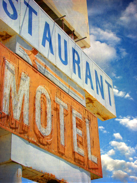 istock neon motel and restaurant sign 875853896