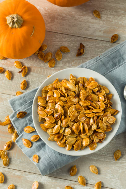 istock Homemade Roasted Spiced Pumpkin Seeds 875858292