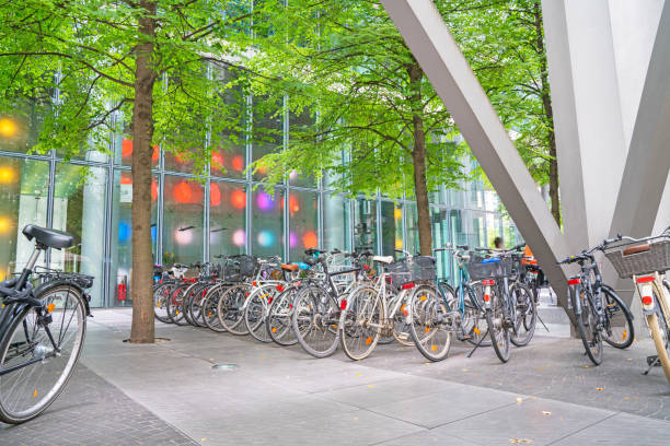 istock landscape,architectural structure, bicycles parked together and  multi-color lights 875858392