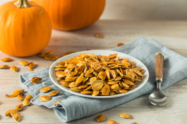 istock Homemade Roasted Spiced Pumpkin Seeds 875860884