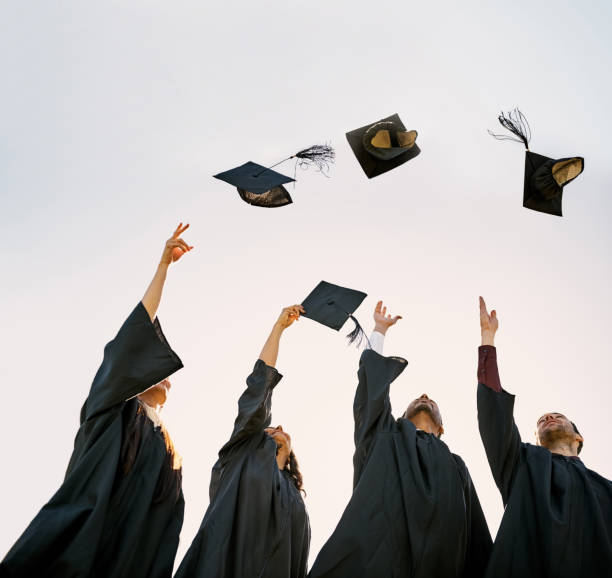 istock Celebrating the end of their academic years 875884740