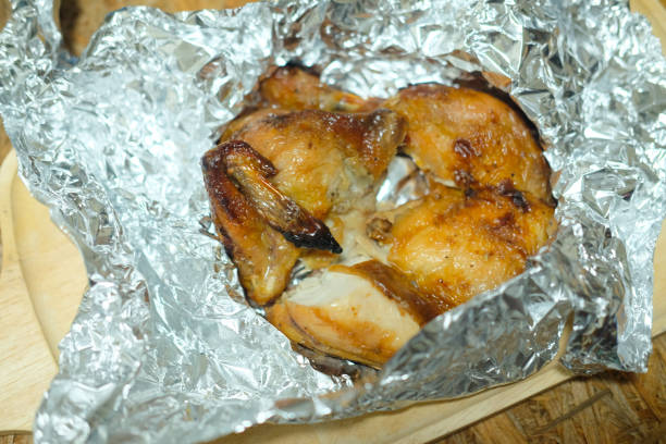 istock Roast quail in the foil, Thai food 875917710
