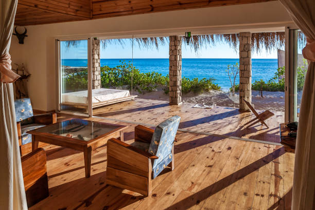 Inside a luxurious suite Inside a luxurious hotel suite with sea view madagascar beach photos stock pictures, royalty-free photos & images