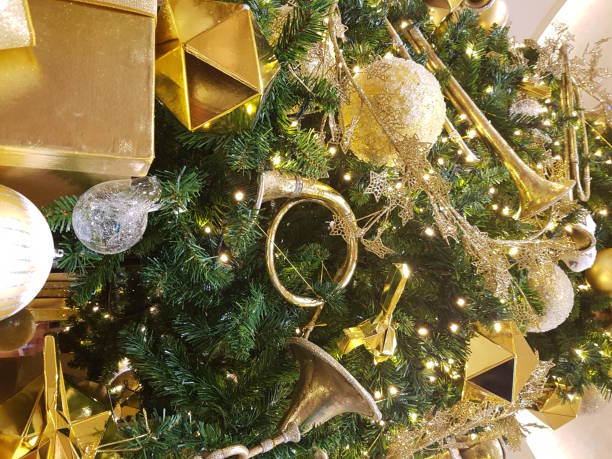 istock Christmas tree in gold colors 875932456