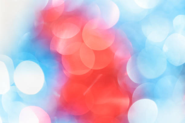 istock Blue and red colors bokeh background. Christmas background texture 875935326
