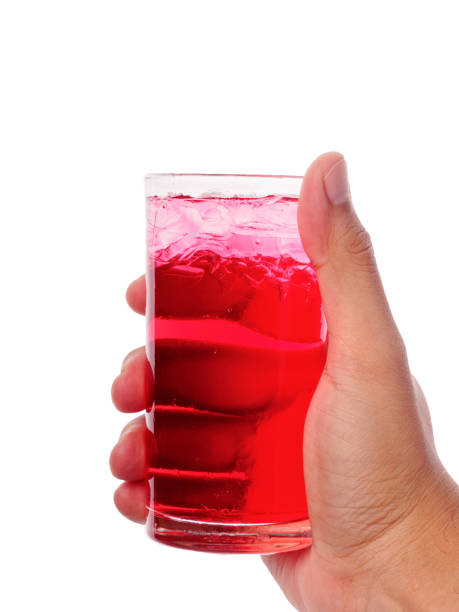 istock male hand holding ice cubes in glass 875936536