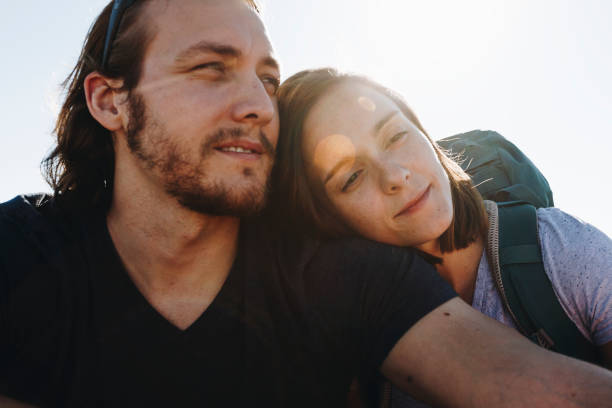 istock Couple hiking together in the wilderness 875941274