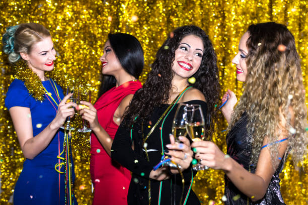 istock Girls having fun on New Year's party 875944640