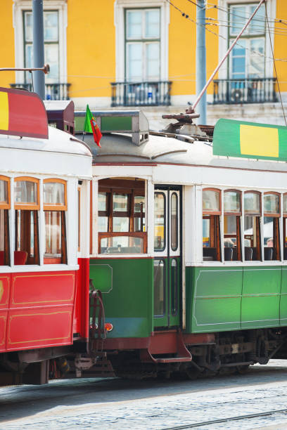 istock Famous Lisbon trams on the street. 875944740