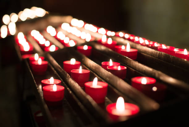 istock Burning candles on altar in church. 875944768