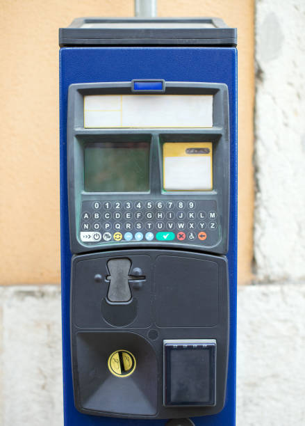 istock Car parking machine on the street. 875944882