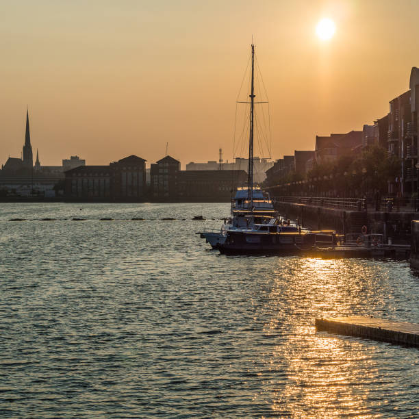 istock Preston docks and skyline at sunrise 875953092