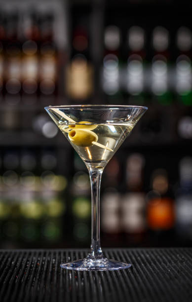 istock Martini cocktail with green olives 875958056
