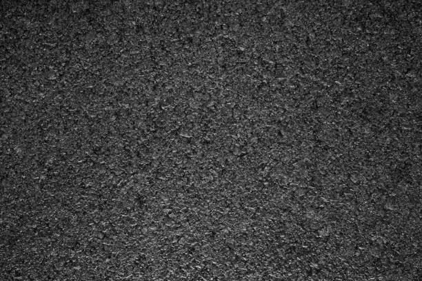 istock Asphalt background texture with some fine grain with road 875960570