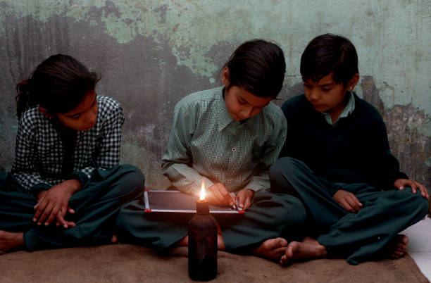 istock Poor little girls studying at home 875961154