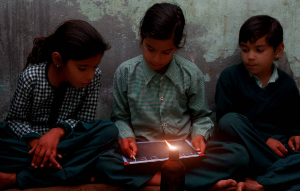 istock Poor little girls studying at home 875961162