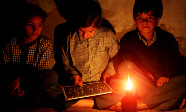 istock Poor little girls studying at home 875961176